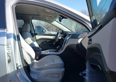 2016 Cadillac Srx Luxury Collection z USA, uszkodzony, nr VIN 3GYFNEE32GS587245